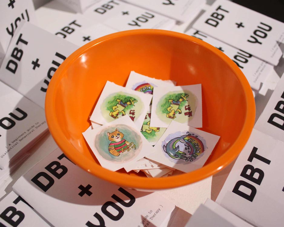 sticker bowl surrounded by mini-zines